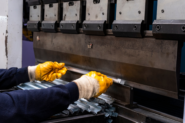 Person Operating a Press Brake
